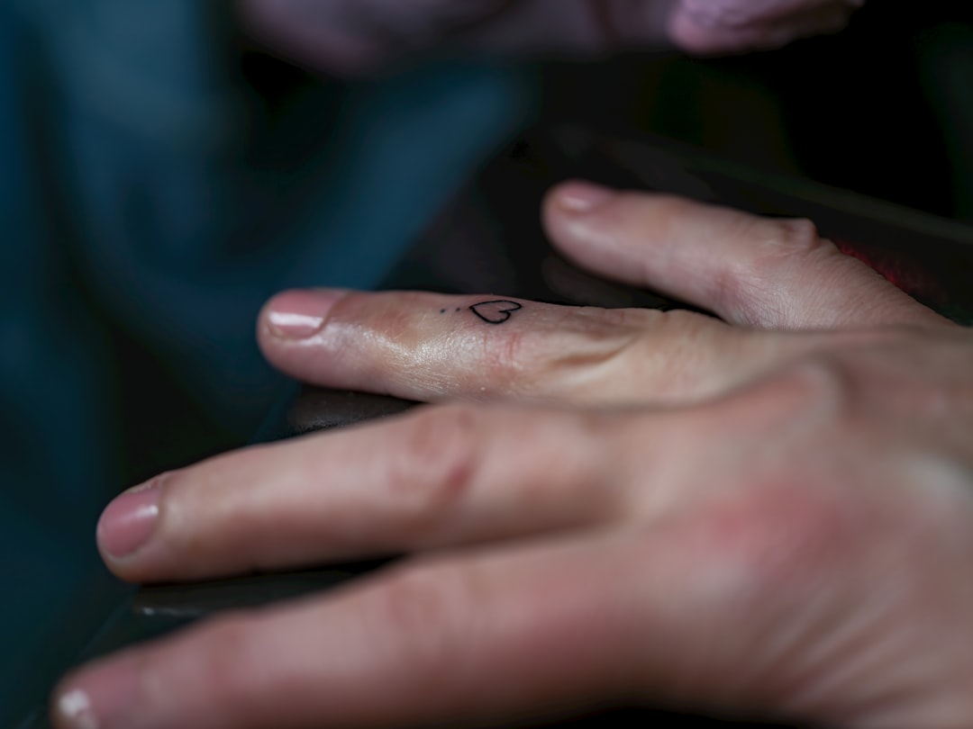 A close up of a person holding a cell phone