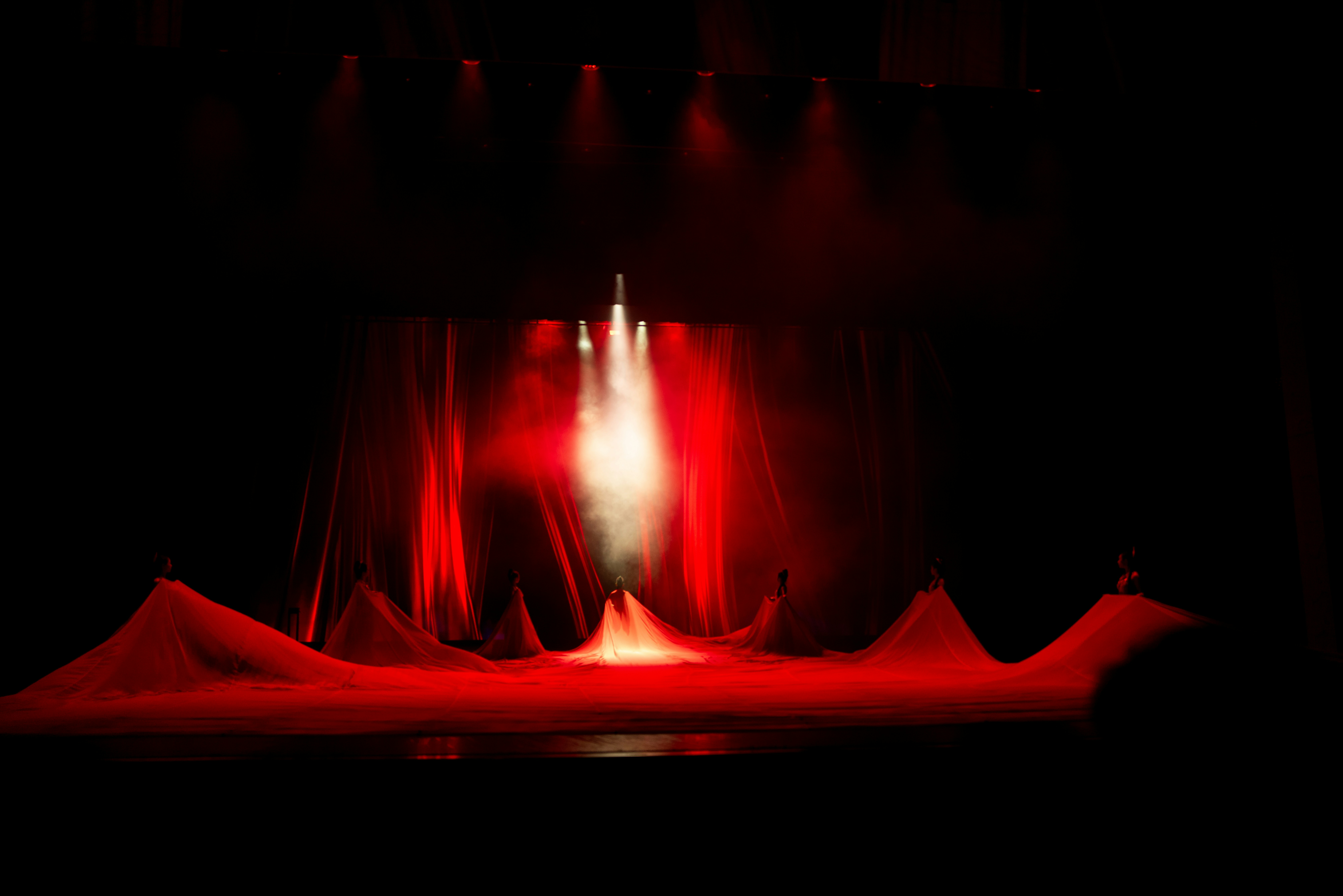 Stage with red lighting and smoke effects