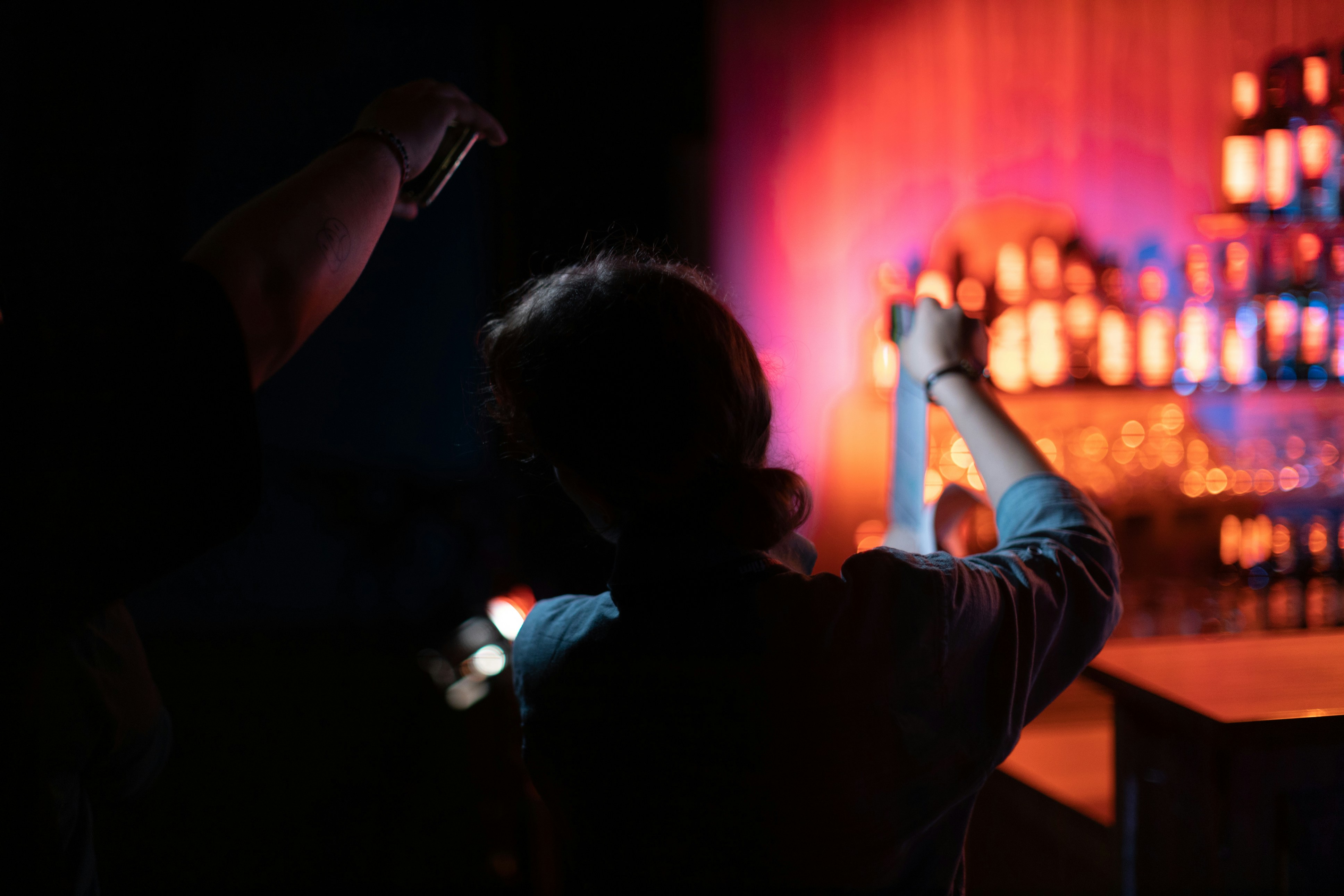 a person holding a light saber