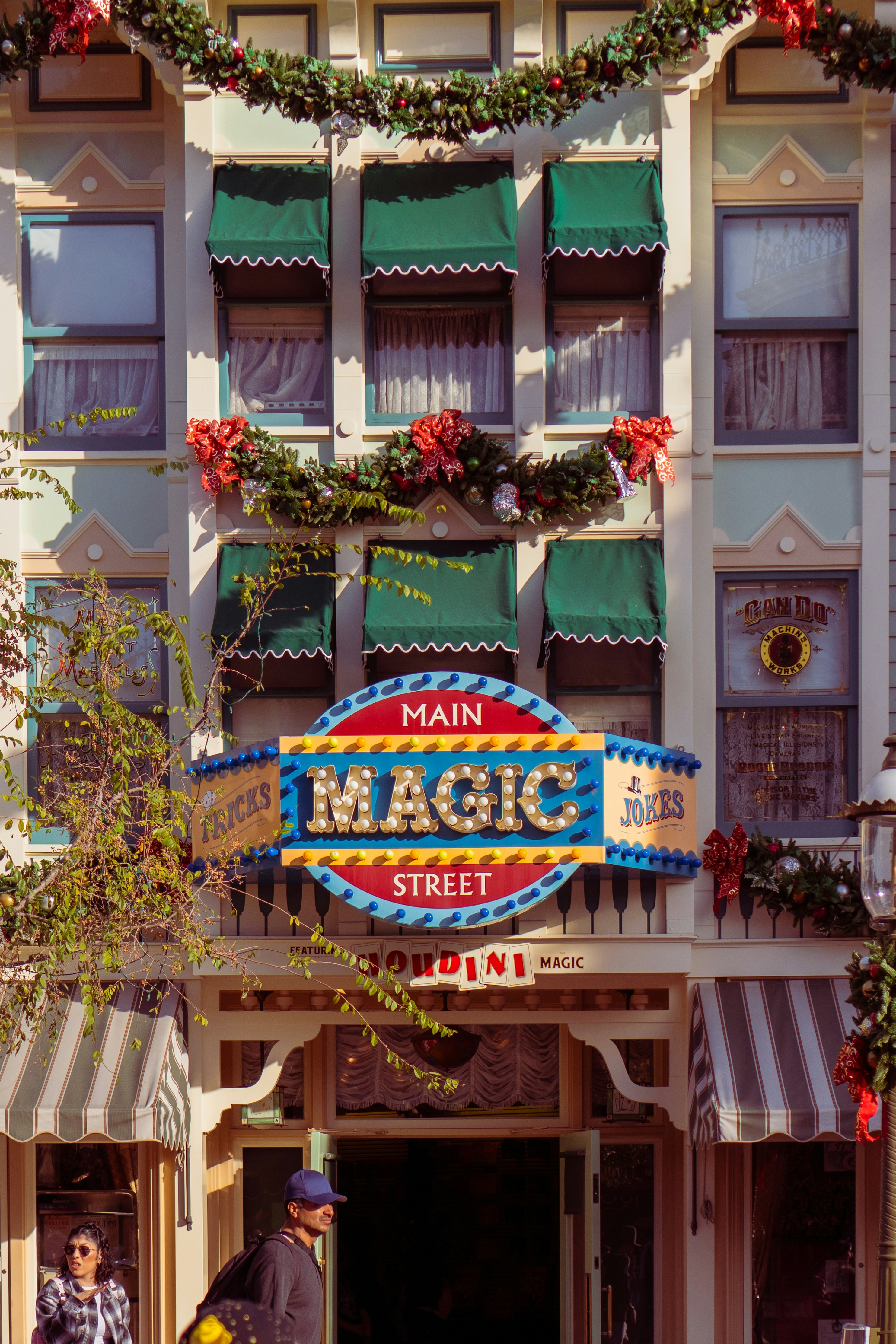 a building with a sign that says main magic street