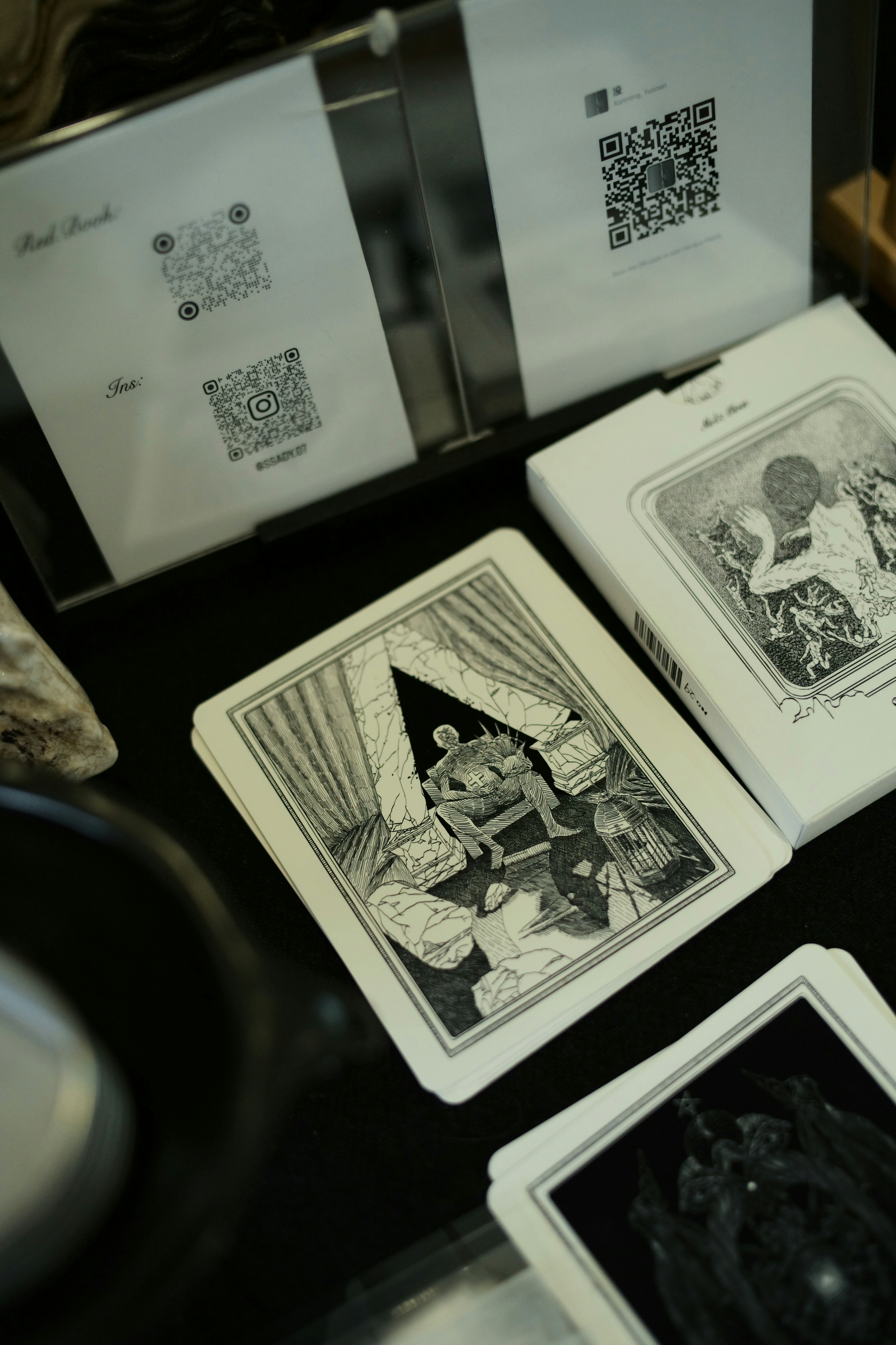 A table topped with cards and pictures on top of it