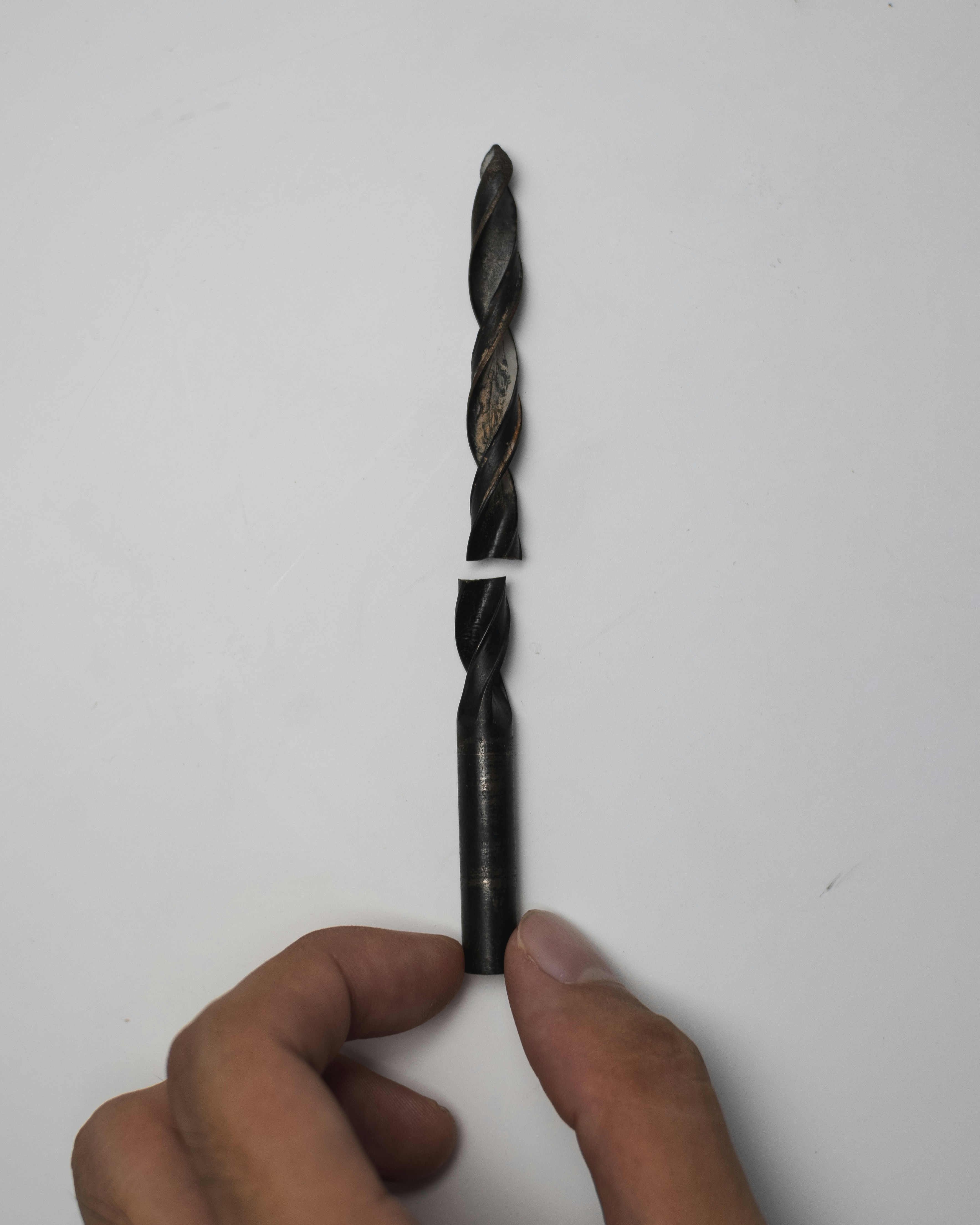 person holding black and white pen