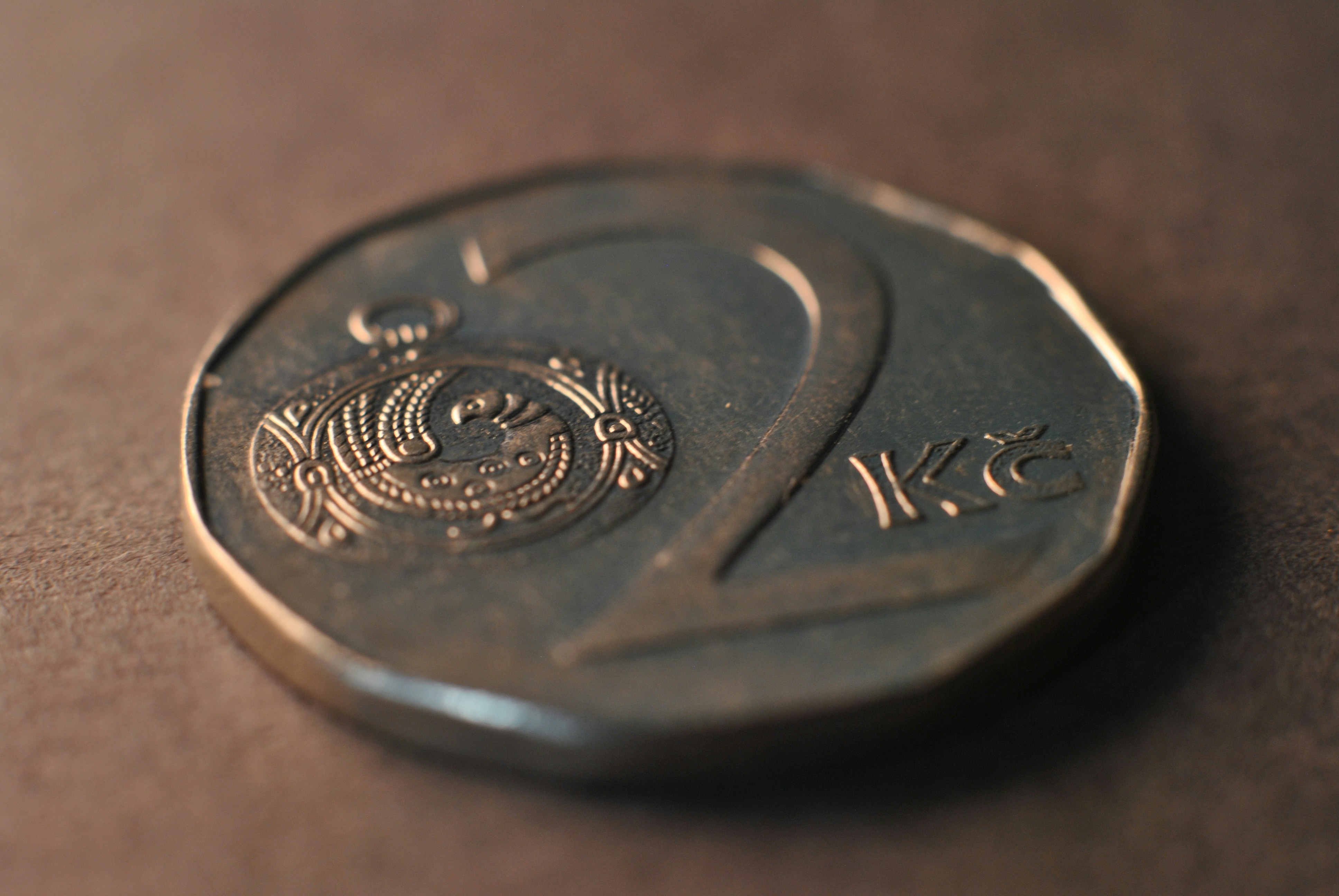 A close up of a coin on a table