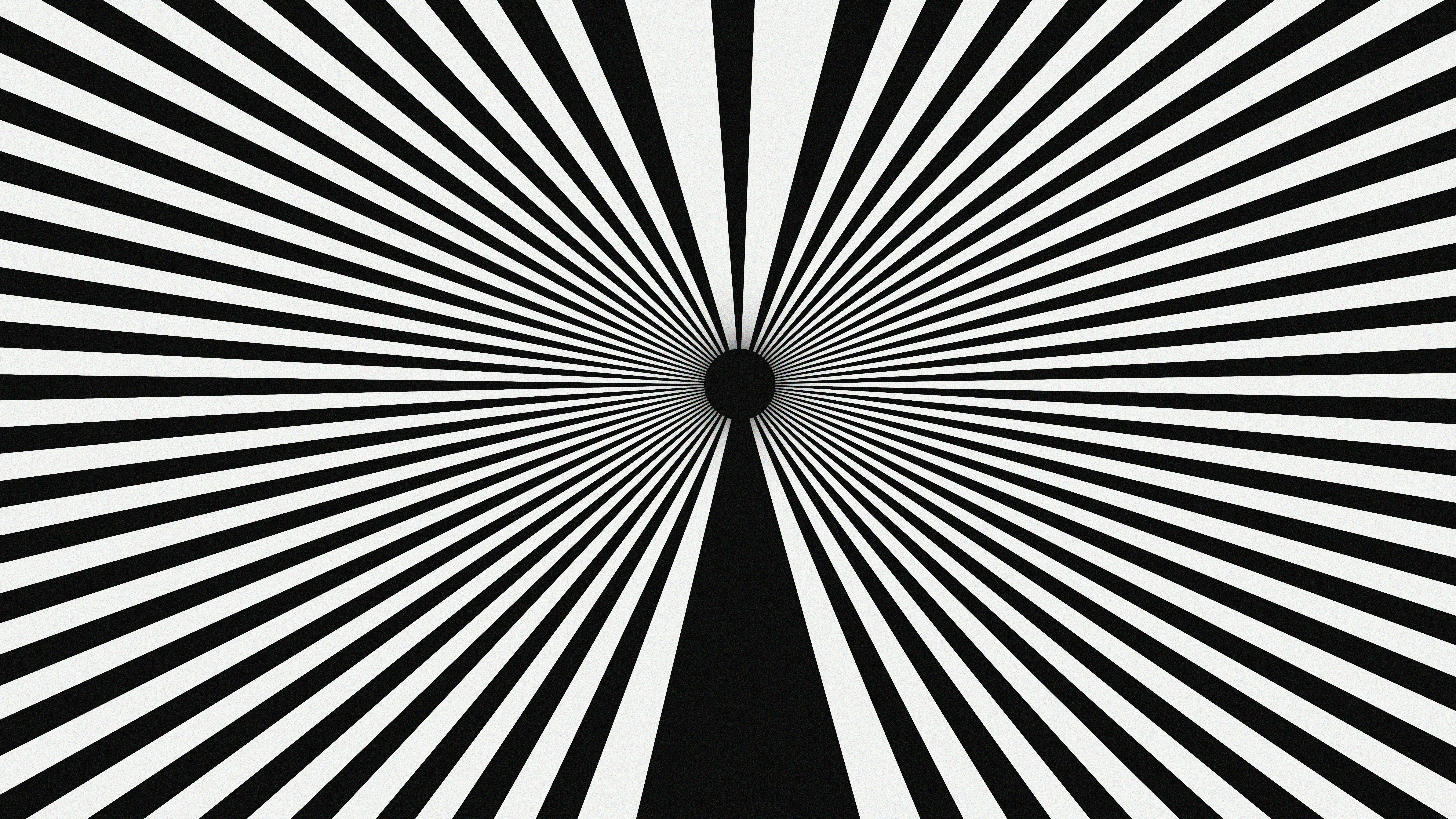 Black and white radial pattern with a dark center