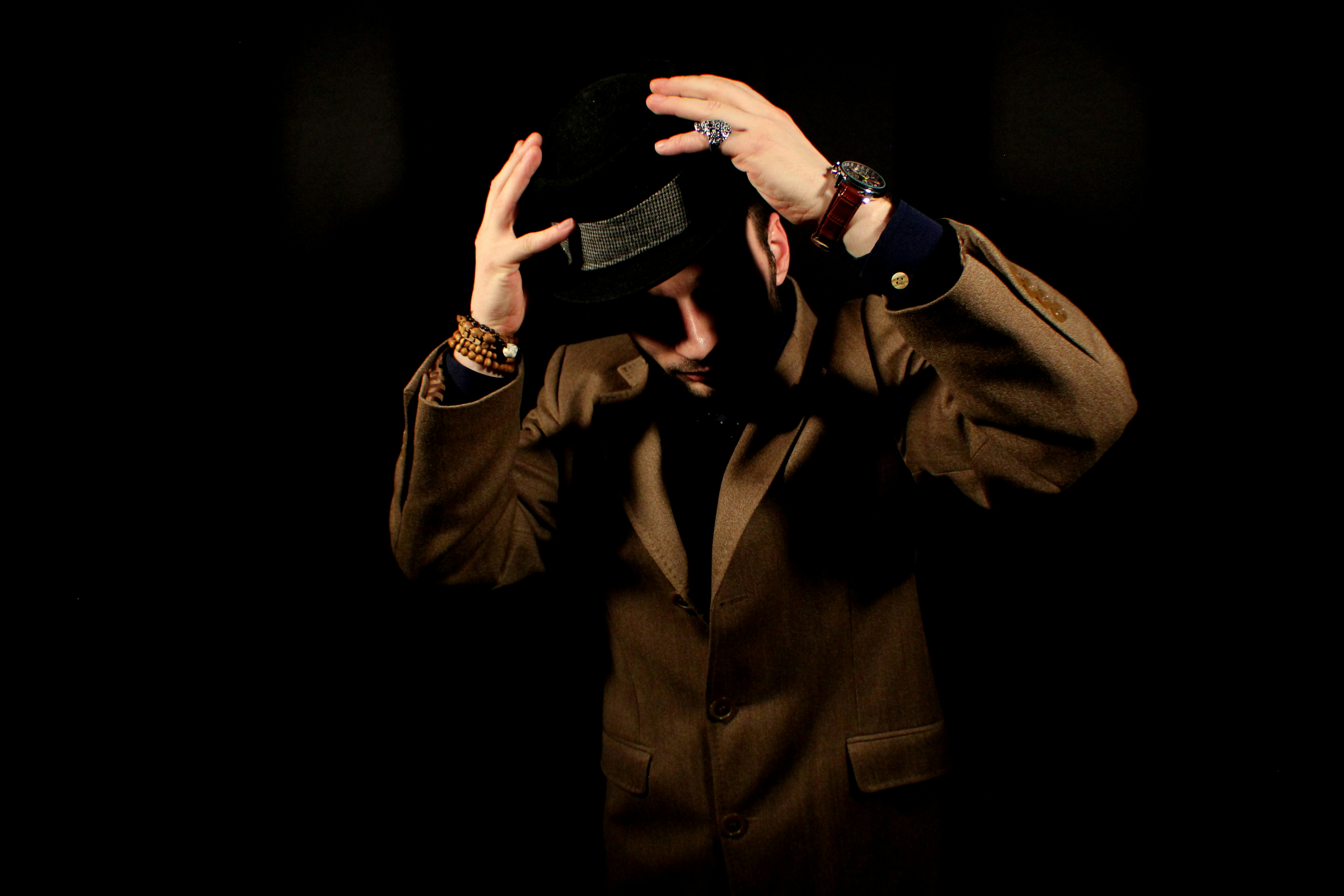 man wearing hat and jacket