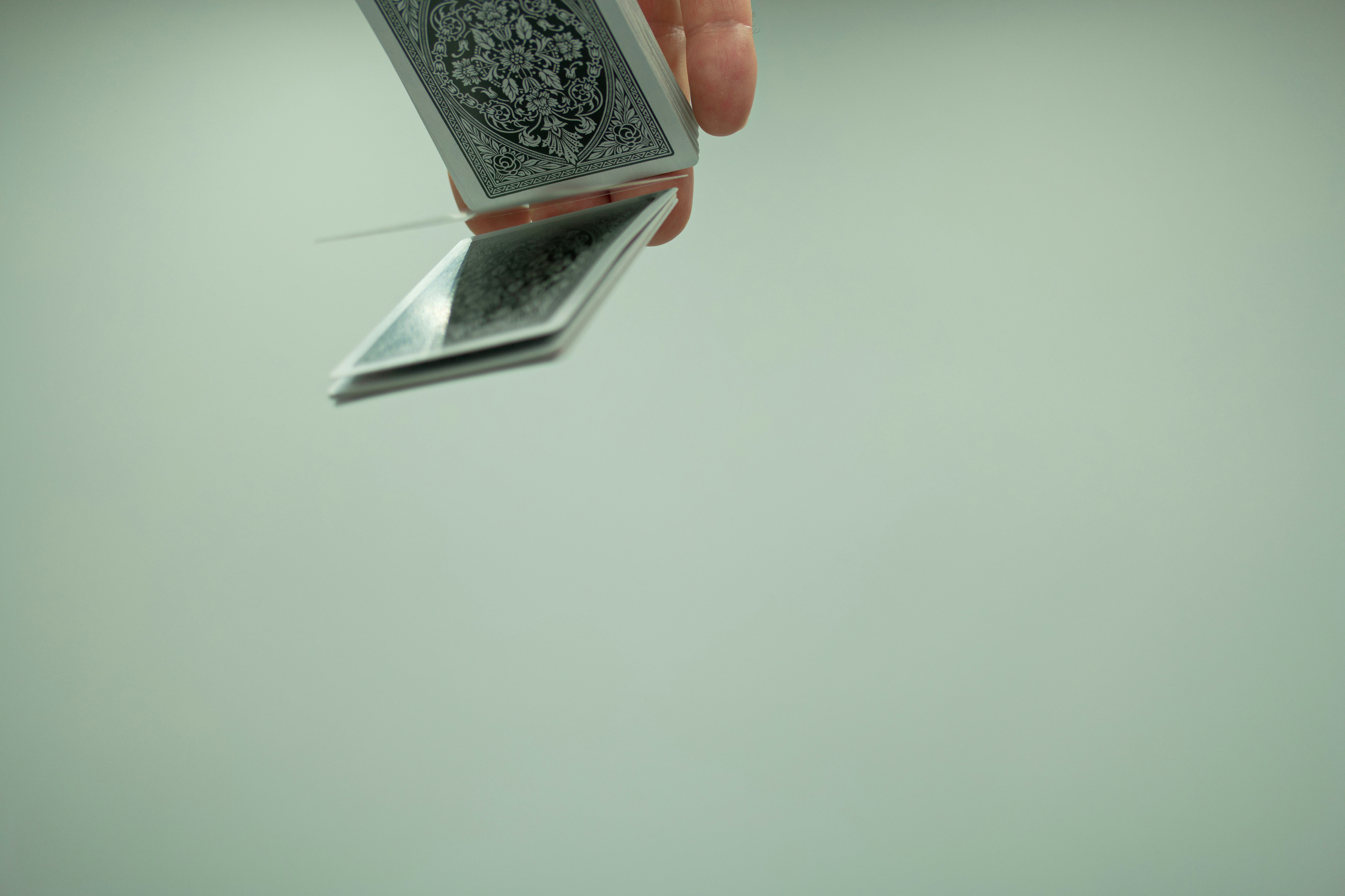 a person holding a cell phone in their hand