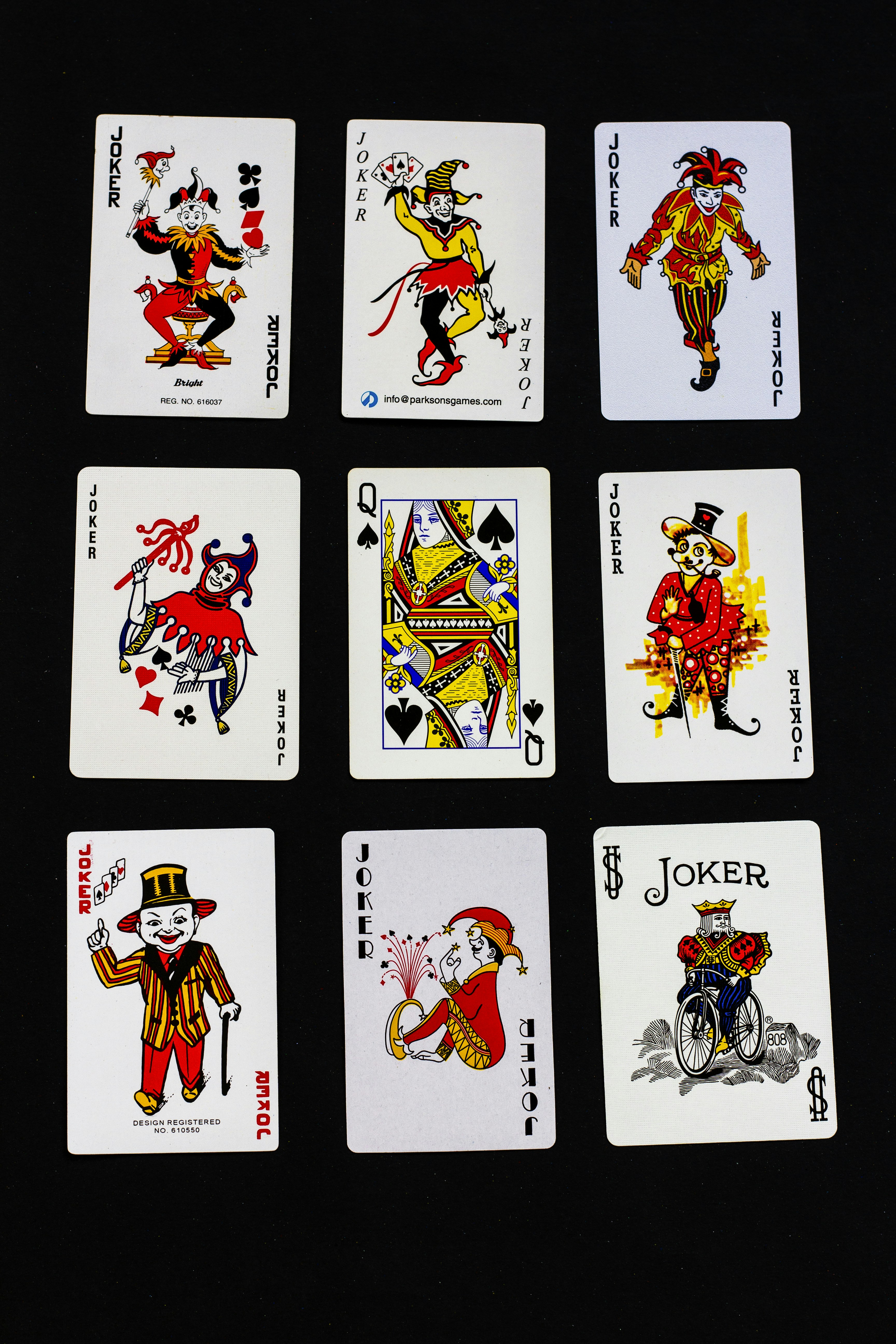 four of a kind of playing cards with different designs