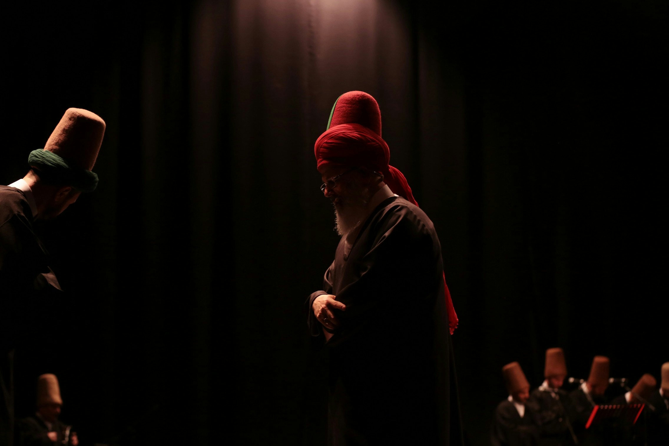 two men performing on stage