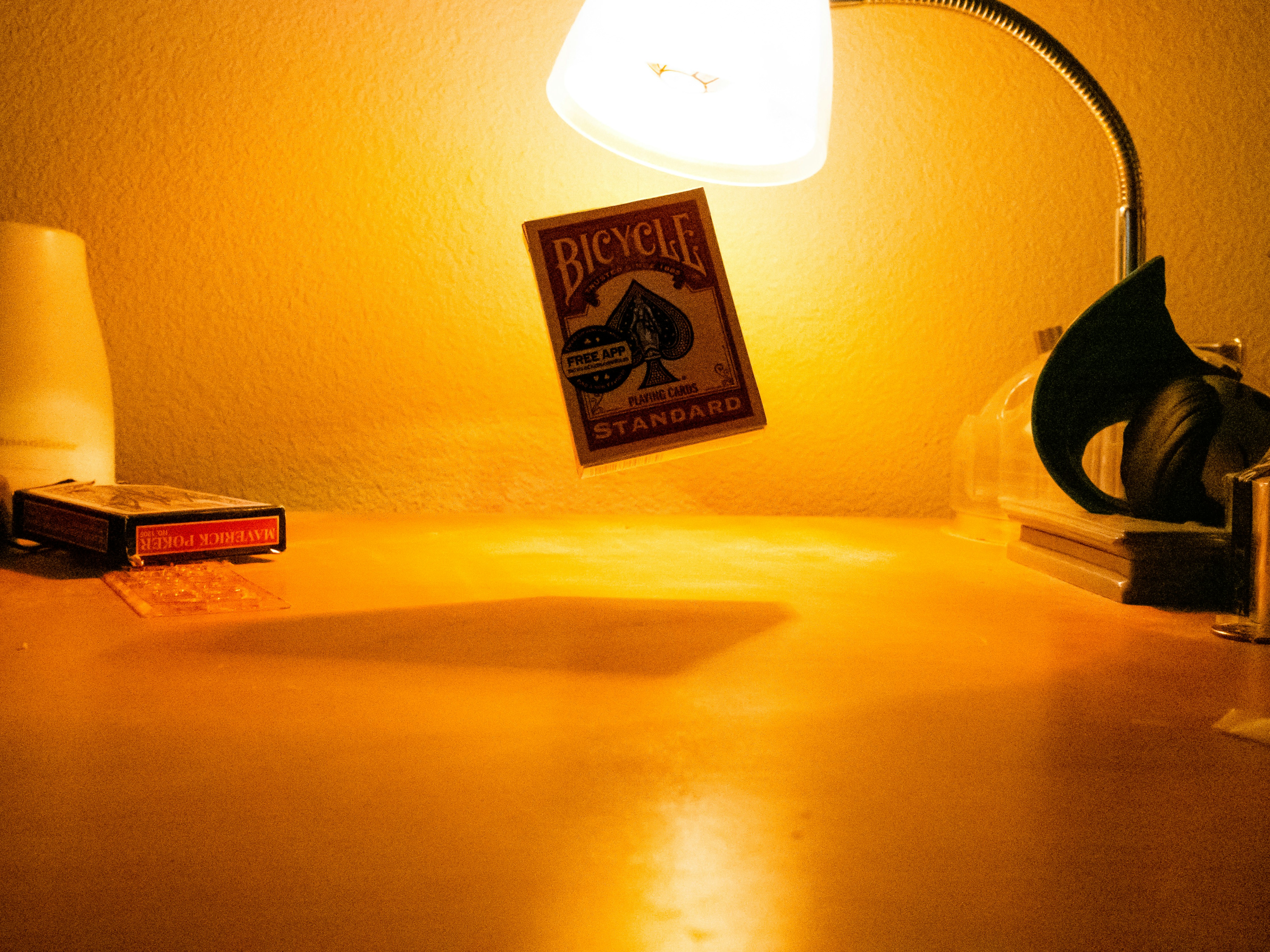 ❓ FAQ by Magic Trick a desk with a lamp and a book on it