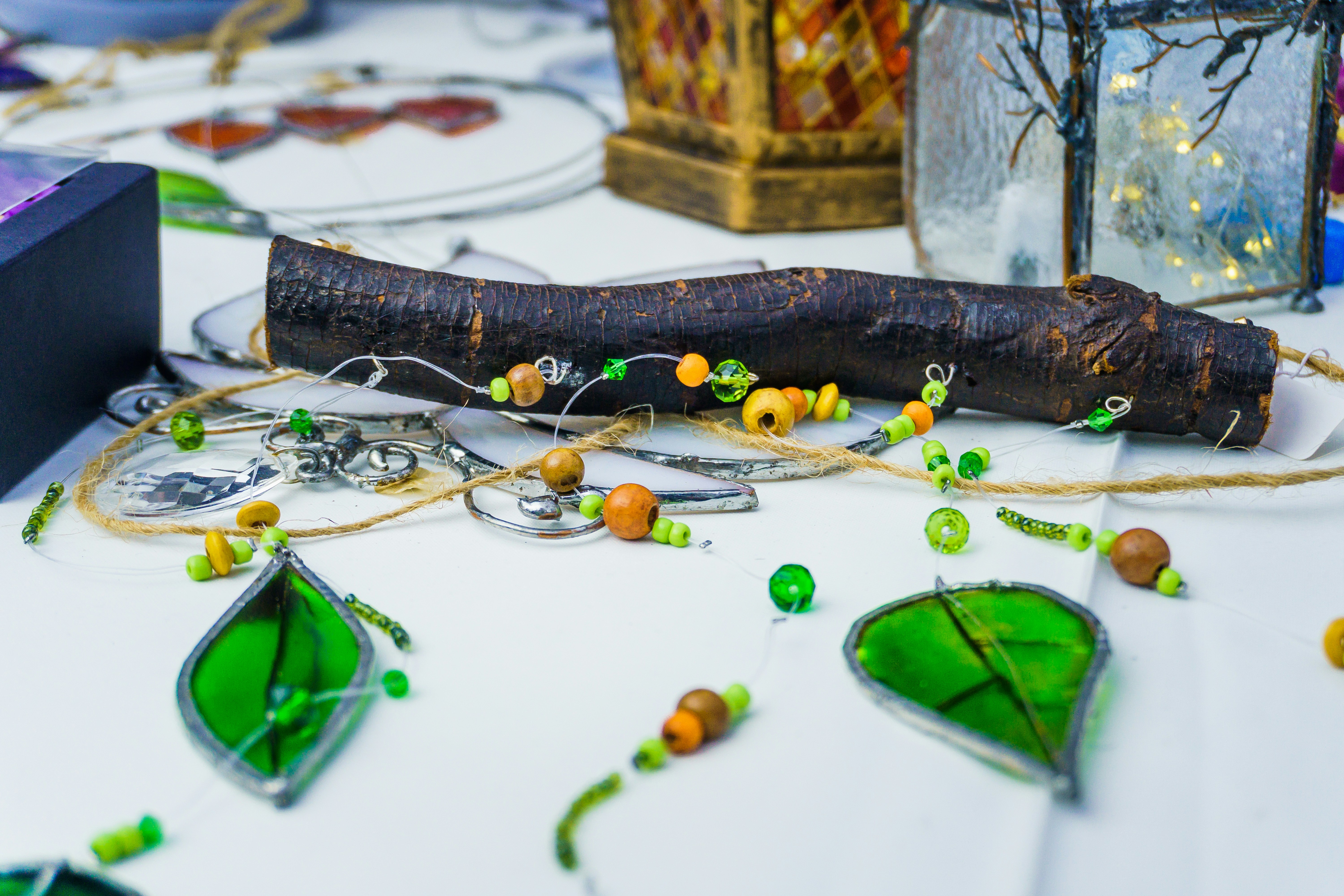 DIY magic props by Magic Trick Handmade crafts with wooden beads and green leaf charms
