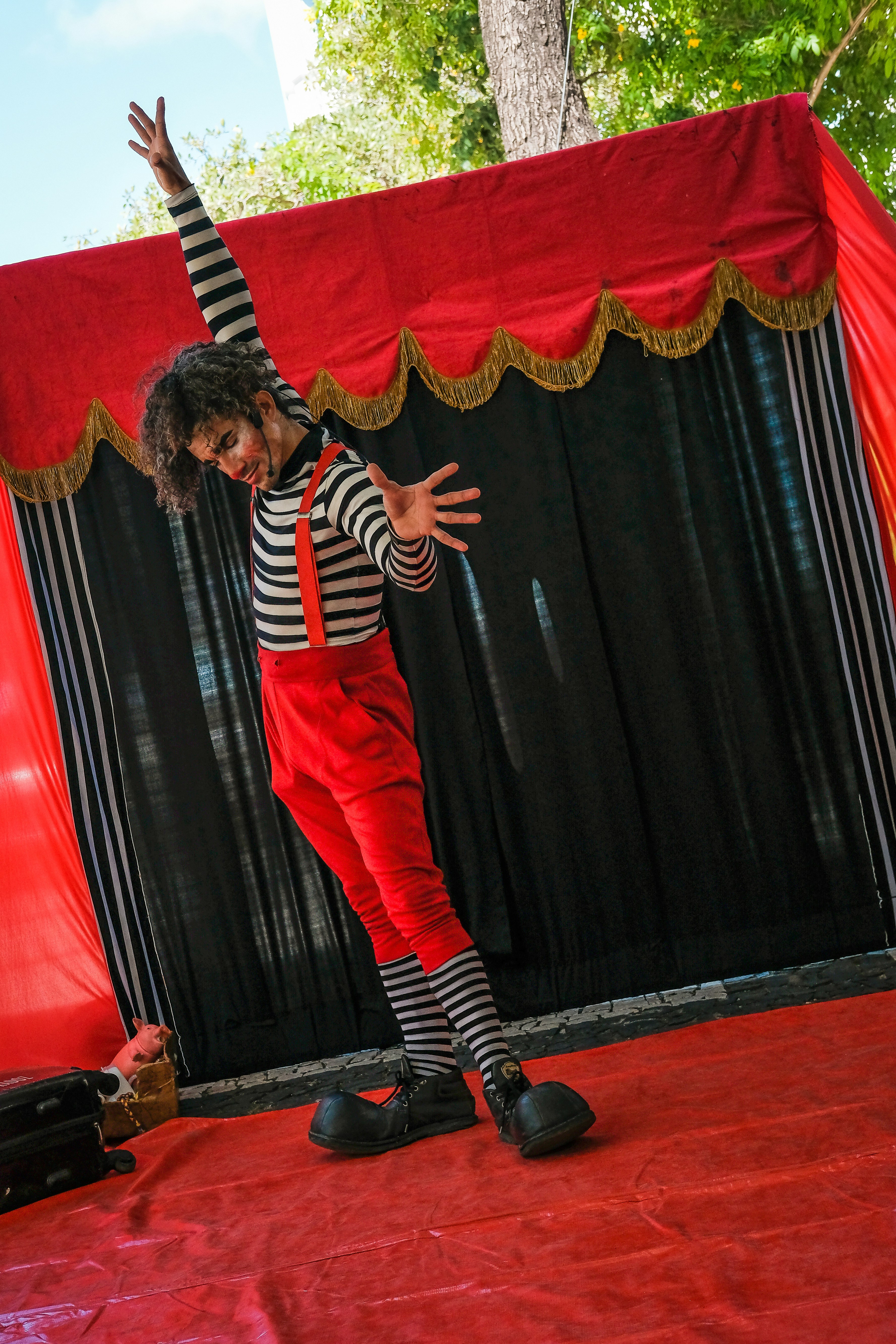 FAQ by Magic Trick man standing on stage