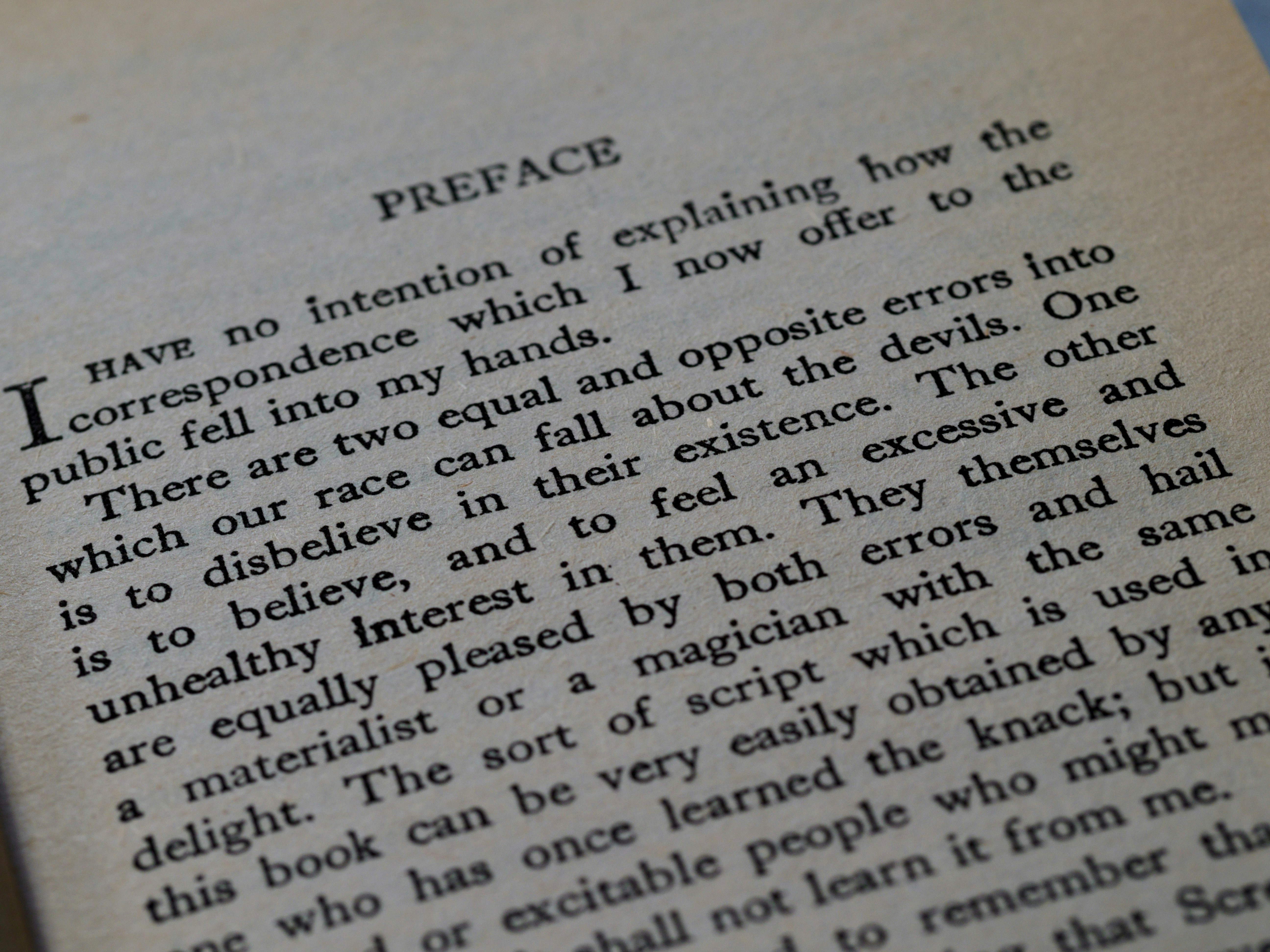 Close up, bokeh, macro, blur, blurred background, close focus, lettering, type, print, litho printing, typography, fonts, preface, c.s. lewis, screwtape letters,
by Magic Trick text