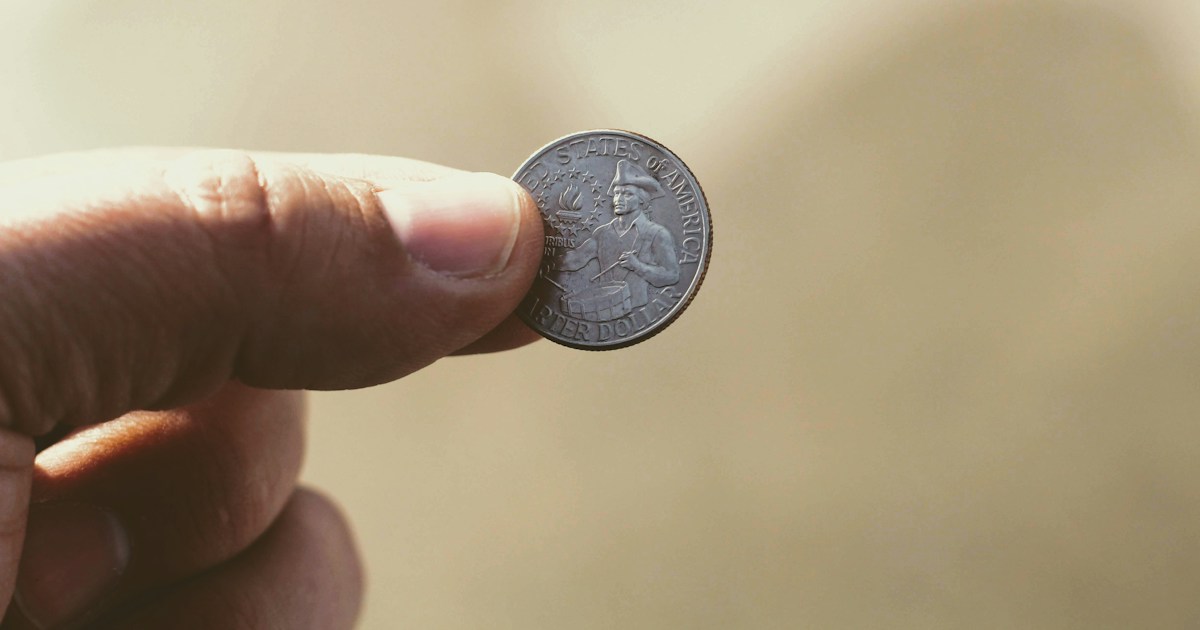 round silver-colored coin